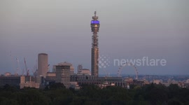 The July Full Moon known as the Buck Moon rises near the BT Tower in London