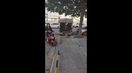 Worker smoothly lines up shared electric bikes in China