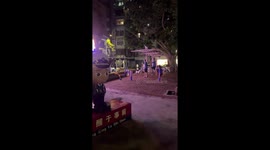 Grandfather lets puppy run on fitness equipment