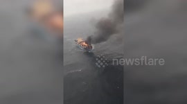 Major fire on cargo ship carrying hazardous materials off coast in western India; Indian Coast Guard in rescue operation