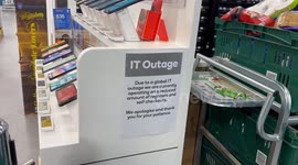 IT outage sign in Woolworths store in Sydney, Australia