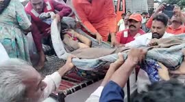 Indian National Disaster Response Force rescues sick woman in western India amid floods