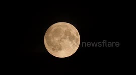 Spectacular full Buck Moon seen rising in Kent, UK