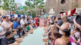 The annual Spaghetti eating contest at the Soho Fete in London