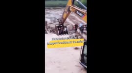 Excavator transfers trapped residents to safety in China's Sichuan