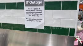 IT outage sign in Woolworths store in Sydney, Australia