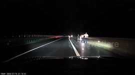 Local villagers used warning lights to halt traffic after highway bridge collapsed in northern China