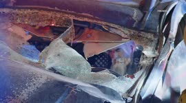 USA: SUV Wedged Partially Under Big Rig Trapping Driver