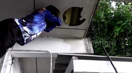 Jumbo python lives undetected in dorm's ceiling for a year after attacking worker