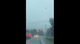 Storm and lightning captured at traffic light in Ballston Spa, NY