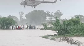 Locals rescued after heavy rainfall leaves them stranded in western India