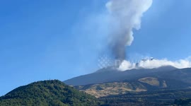 Etna spews tall plume of volcanic ash during eruption