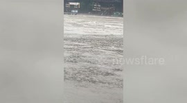 Heroic fisherman saves woman swept away by river in China