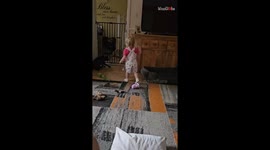 Pure love: Little girl's tender kiss to her furry companion