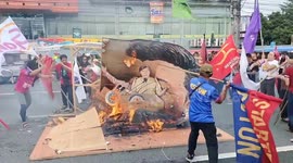 Protesters burn Biden and Xi Jinping effigies as Philippine president gives State of the Nation address