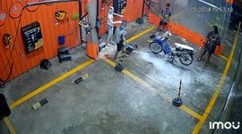 Car wash surprise: customers get a soapy bath in Suphan Buri, Thailand