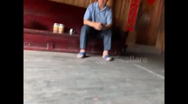 Grandfather's poignant final moments with grandson in China
