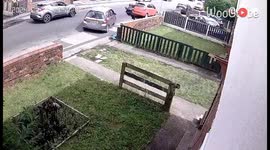 CCTV footage of reckless driver damaging property during heated altercation