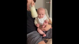 Hangry baby is in no mood to joke around after seeing bottle of milk