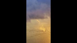 Spectacular waterspout appears off coast of Guangdong, China