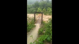 Flash floods destroyed bridges and many houses in northwest Vietnam