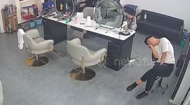Barber falls asleep on chair and topples over