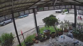 Heartstopping moment toddler swerves push bike to avoid oncoming car