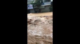 Sudden flash floods caused thousands of cars and houses to be submerged in water
