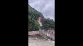 Landslide crashes down hill following heavy rain in Sichuan, China