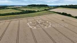 A large crop circle appears in a wheat field near Badbury Rings near Wimborne in Dorset, UK.