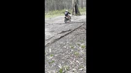 Join the adventure as a teenage boy hits the trails on his Honda dirt bike, bringing energy and excitement to every twist and turn!