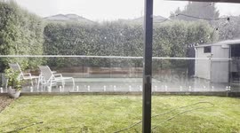 Relax and enjoy the soothing sounds of a gentle rain shower in this calming video.