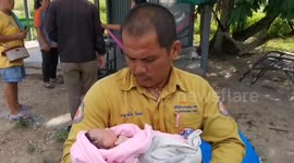 Thai woman rescues newborn baby abandoned in cardboard box