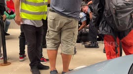 At an Anti-Netanyahu, and pro-Palestine, protest in Chicago a protestor is arrested by Chicago Police