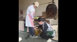Protective bird bites woman to defend its owner