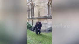 Graduate falls in ditch and sprains ankle during hat throw - but still went out