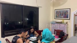Family startled by thunderstorm during dinner in Iloilo City, Philippines