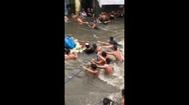 Rescue efforts in Catmon, Malabon during typhoon Gaemi floods