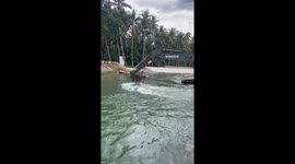 People enjoy revolving excavator ride over river in Cotabato City