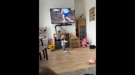 Toddler's ambitious run ends in a tumble, followed by the cutest recovery