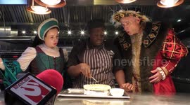 Horrible Histories Terrible Tudors stars Neal Foster and Emma Swan in character watch pie being made