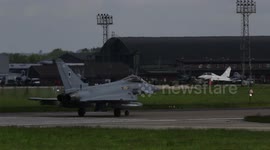 Rear tyres fail on RAF jet fighter as it takes off