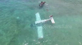 Light aircraft crashes into the sea off Hawaii beach
