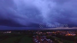 Drone footage of a storm rolling across a town in Northern Ireland