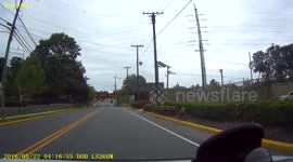 Kids doing stunts ride bikes into oncoming traffic
