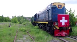 Humanitarian aid convoy arrives in Donetsk, Ukraine by train