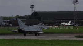 Rear tyres fail on RAF jet fighter as it takes off (edited version)