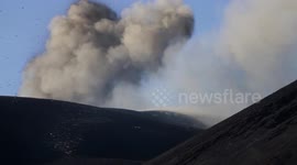 Etna volcano spews lava and ash