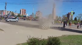 Dust devil forms in Russian street