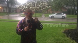Crazy weather reporter reports on Houston storms on Memorial weekend
